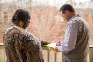 caregiver assisting patient